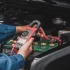 technicians inspect car electrical system
