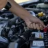 Man is Checking Car Battery